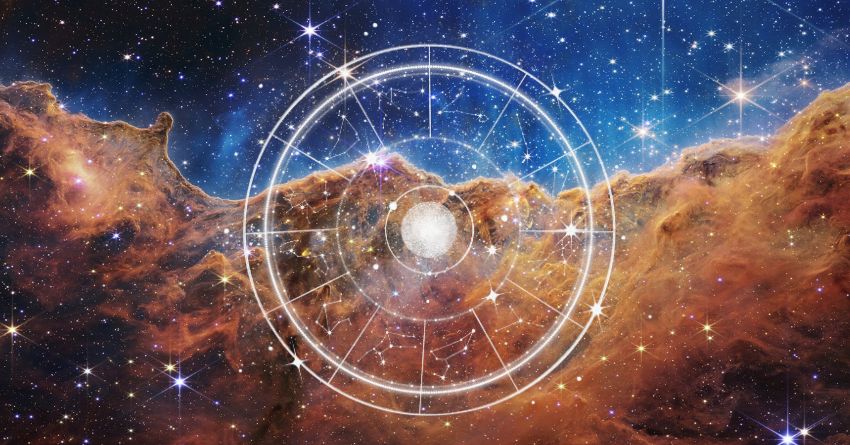 Glowing zodiac wheel with astrological symbols surrounded by swirling orange and blue cosmic clouds