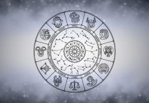 The Days Ahead Bring Heartache — Prepare Yourself Silver zodiac wheel with astrological symbols surrounded by soft gray mist on a bright celestial background
