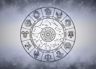 The Days Ahead Bring Heartache — Prepare Yourself Silver zodiac wheel with astrological symbols surrounded by soft gray mist on a bright celestial background